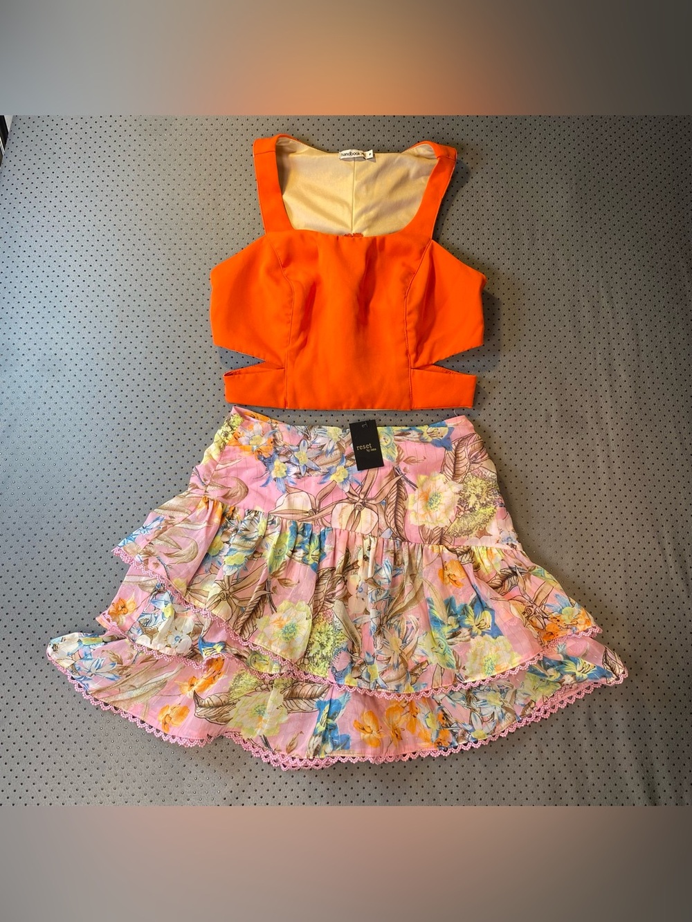 Handbook orange crop top and Reset floral skirt set
Size small